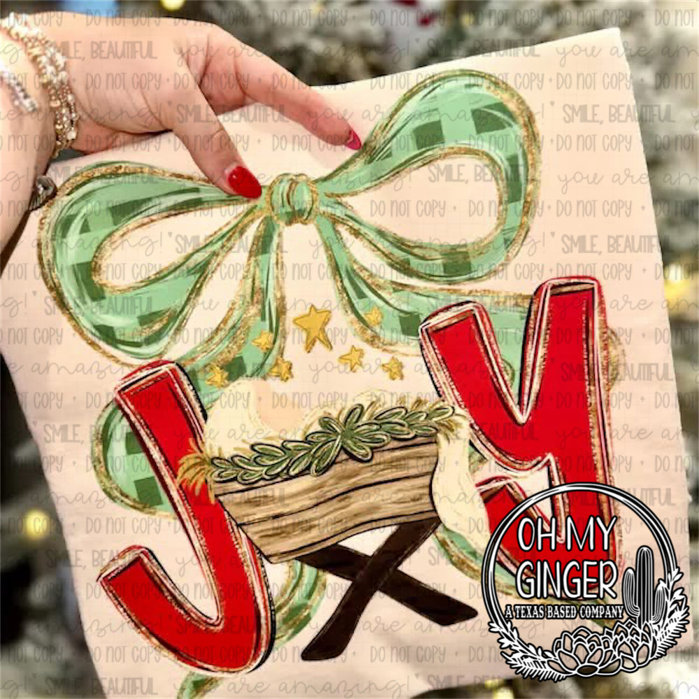 Joy - Baby Jesus — JOY lettering with baby Jesus, evergreen branches and a green bow