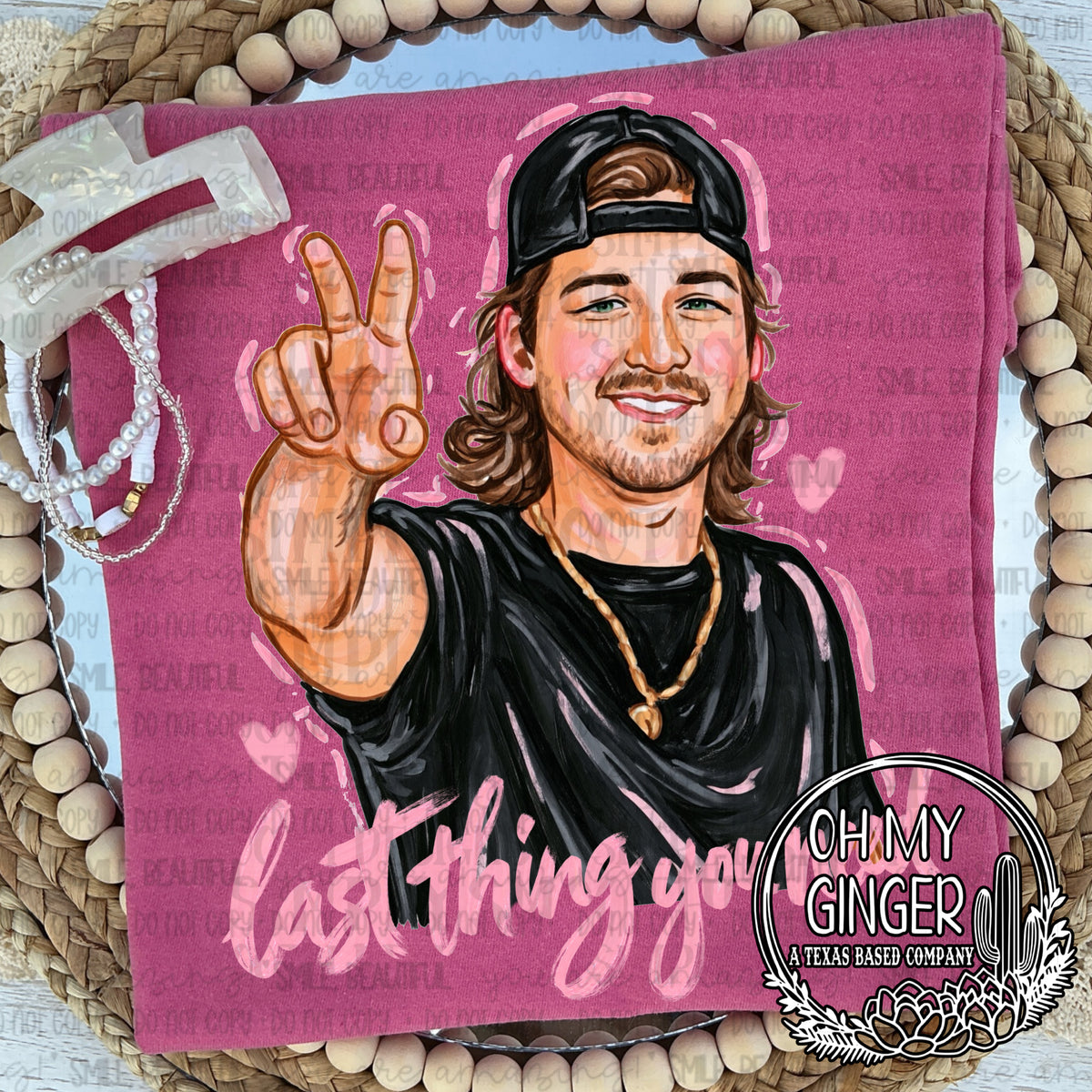 Last Thing You Need — a country-singer portrait and pink script lettering