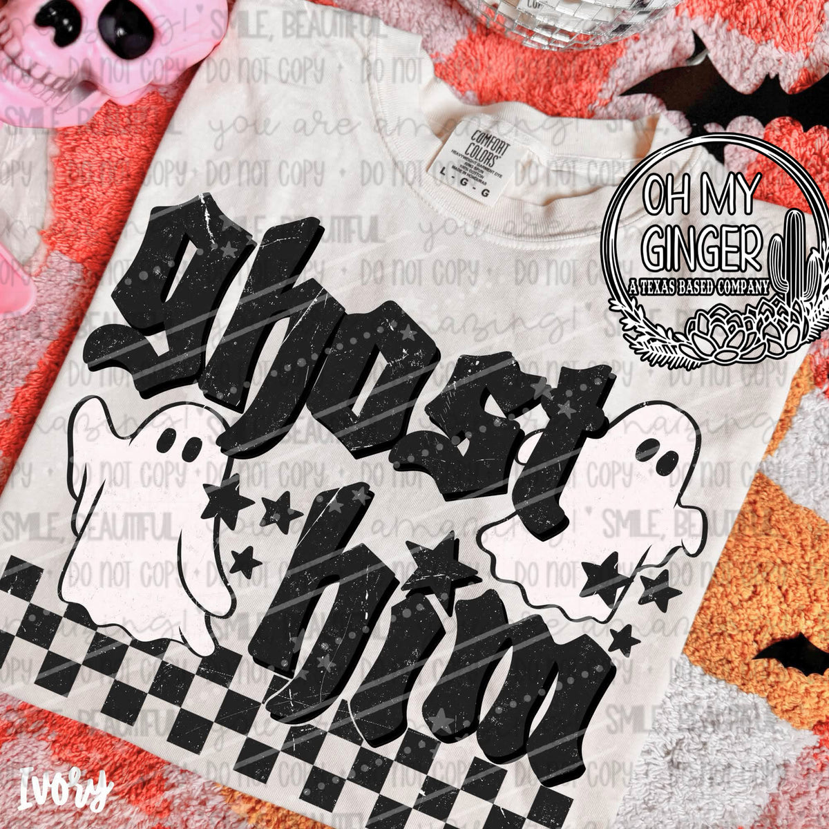 Ghost Duo design featuring two playful white ghosts beneath bold black Ghost Duo lettering with stars and a checkerboard border by Oh My Ginger