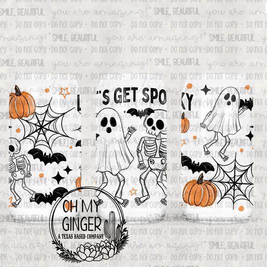 Let’s Get Spooky Glass Can featuring ghosts, a skeleton, bats, pumpkins and spiderwebs with Let's Get Spooky lettering by Oh My Ginger