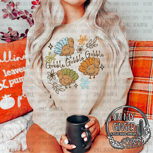 Gobble Gobble Gobble 3 Turkeys — three turkeys with flowers and gobble lettering