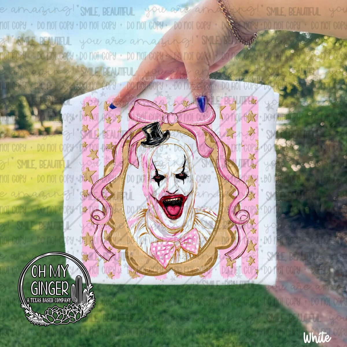 Art Pink Horror Stripes adult apparel design featuring a pink striped horror design featuring a menacing black-and-white clown-inspired character by Oh My Ginger