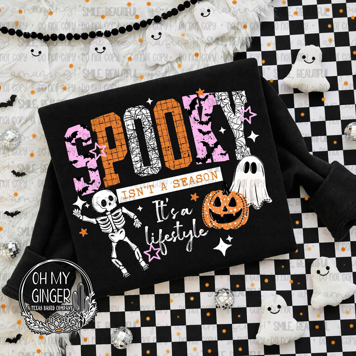 Spooky Isn’t A Season It’s A Lifestyle adult apparel design featuring bold Spooky Isn’t A Season It’s A Lifestyle typography by Oh My Ginger