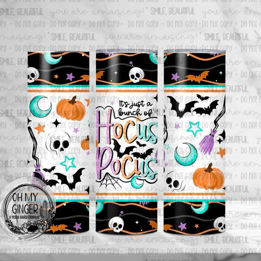 It’s Just A Bunch Of Hocus Pocus Skinny Tumbler featuring Hocus Pocus lettering surrounded by skulls, bats, moons and pumpkins by Oh My Ginger