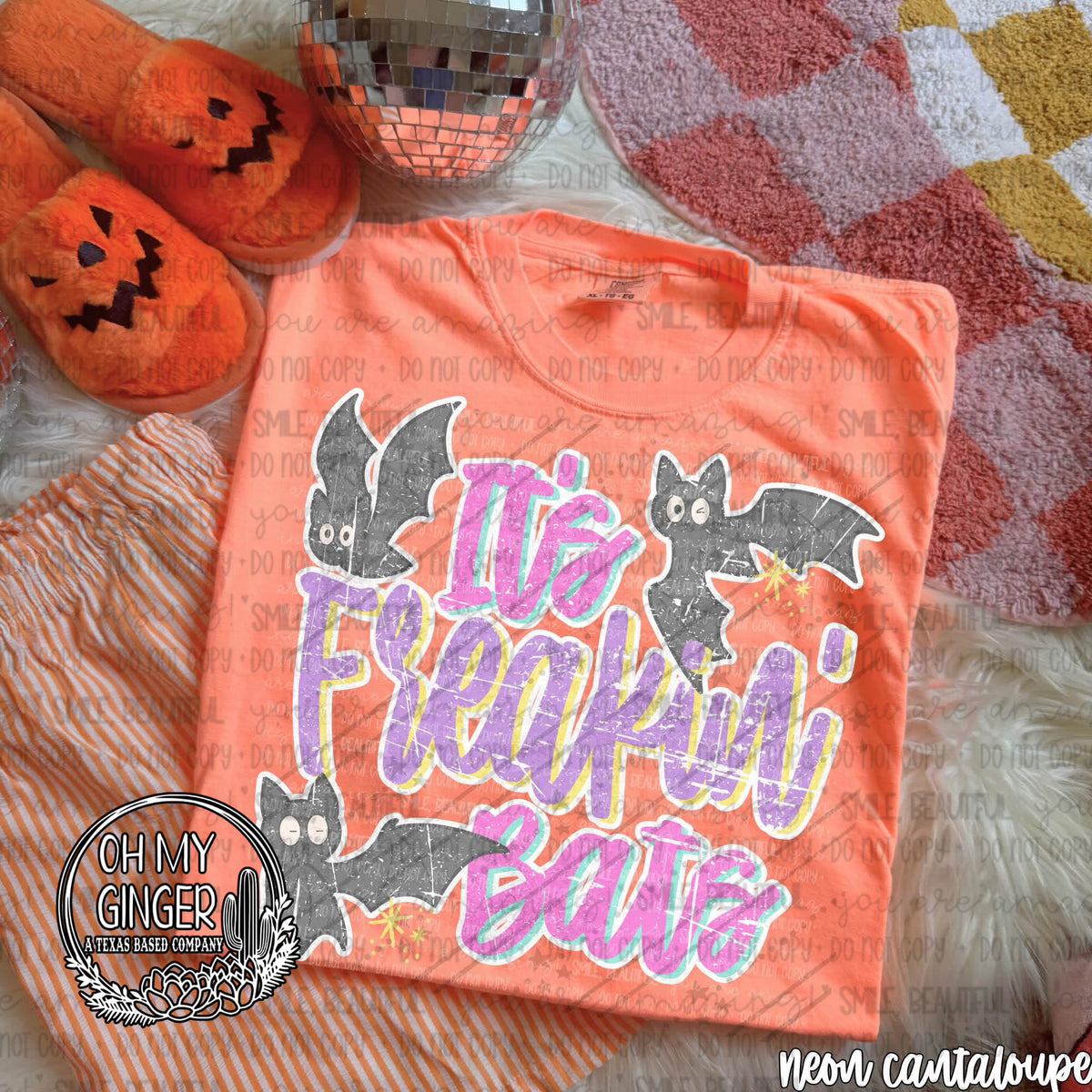 It’s Freakin Bats Distressed adult apparel design featuring distressed It’s Freakin Bats typography with a playful Halloween attitude by Oh My Ginger