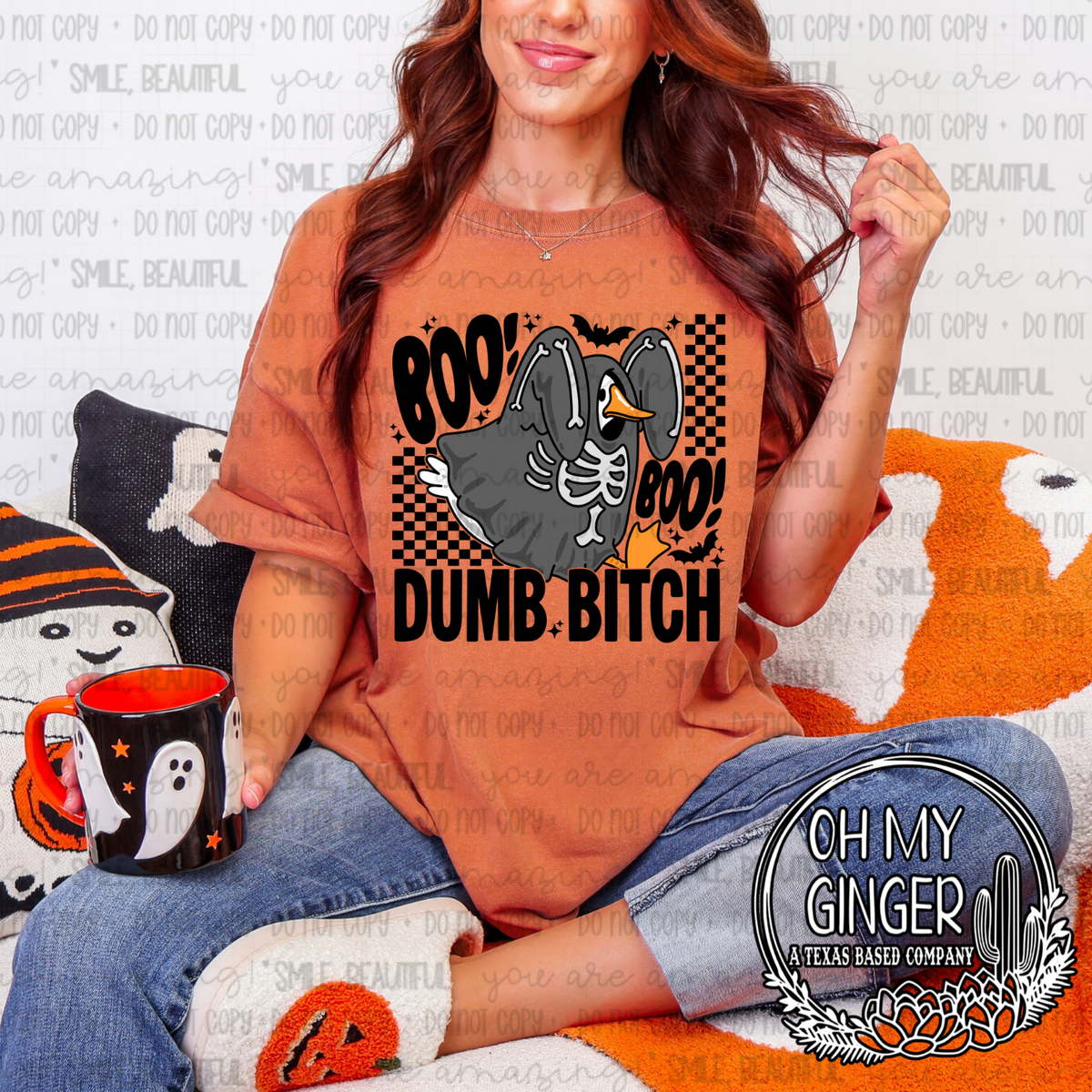 Boo Boo Dumb B*tch — a sarcastic Halloween phrase with ghost and checkerboard details