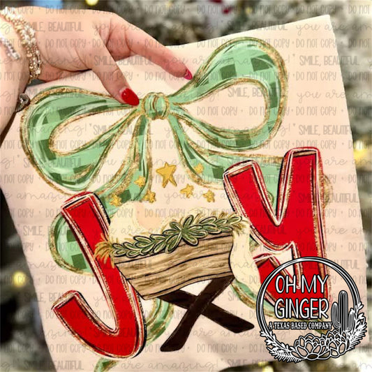 Joy - Baby Jesus — JOY lettering with baby Jesus, evergreen branches and a green bow