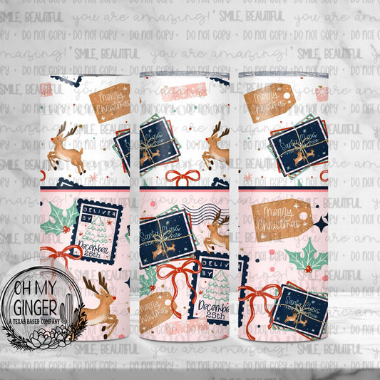 Deliver By December 25th Skinny Tumbler featuring North Pole delivery stamps, reindeer, parcels, holly and red ribbon bows by Oh My Ginger