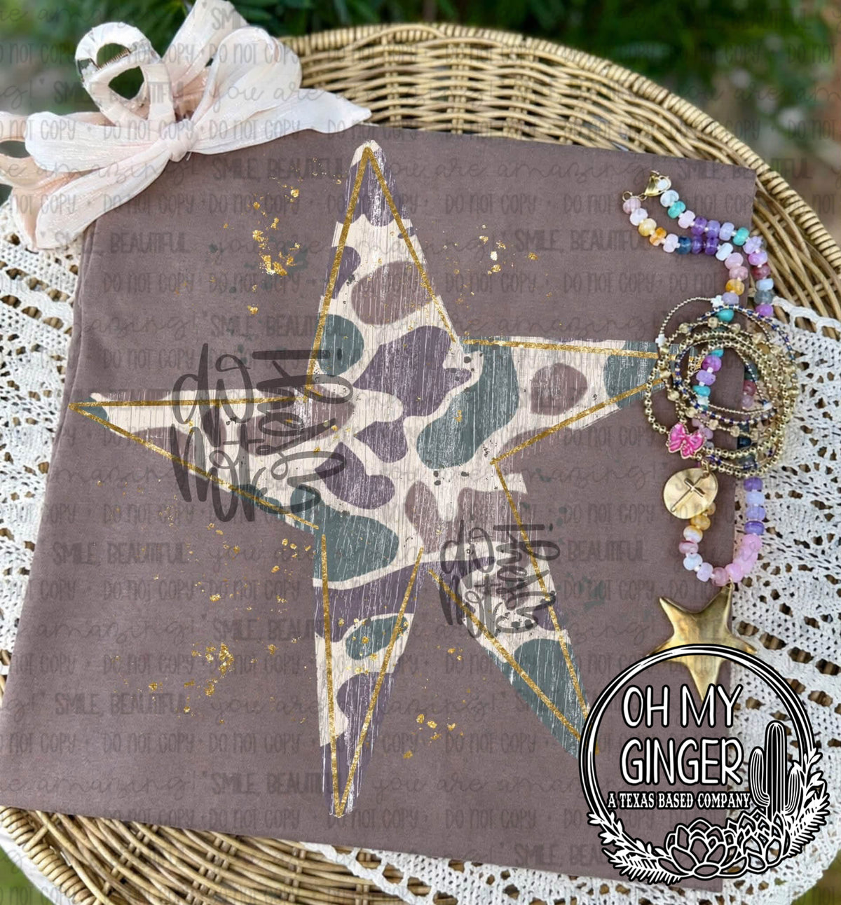 Camo Star — a camouflage-patterned star with hanging ribbon details