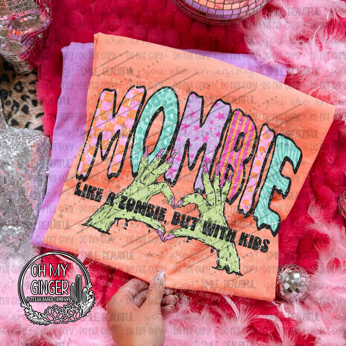 Mombie Hands adult apparel design featuring a funny Mombie-themed design featuring spooky hand imagery by Oh My Ginger