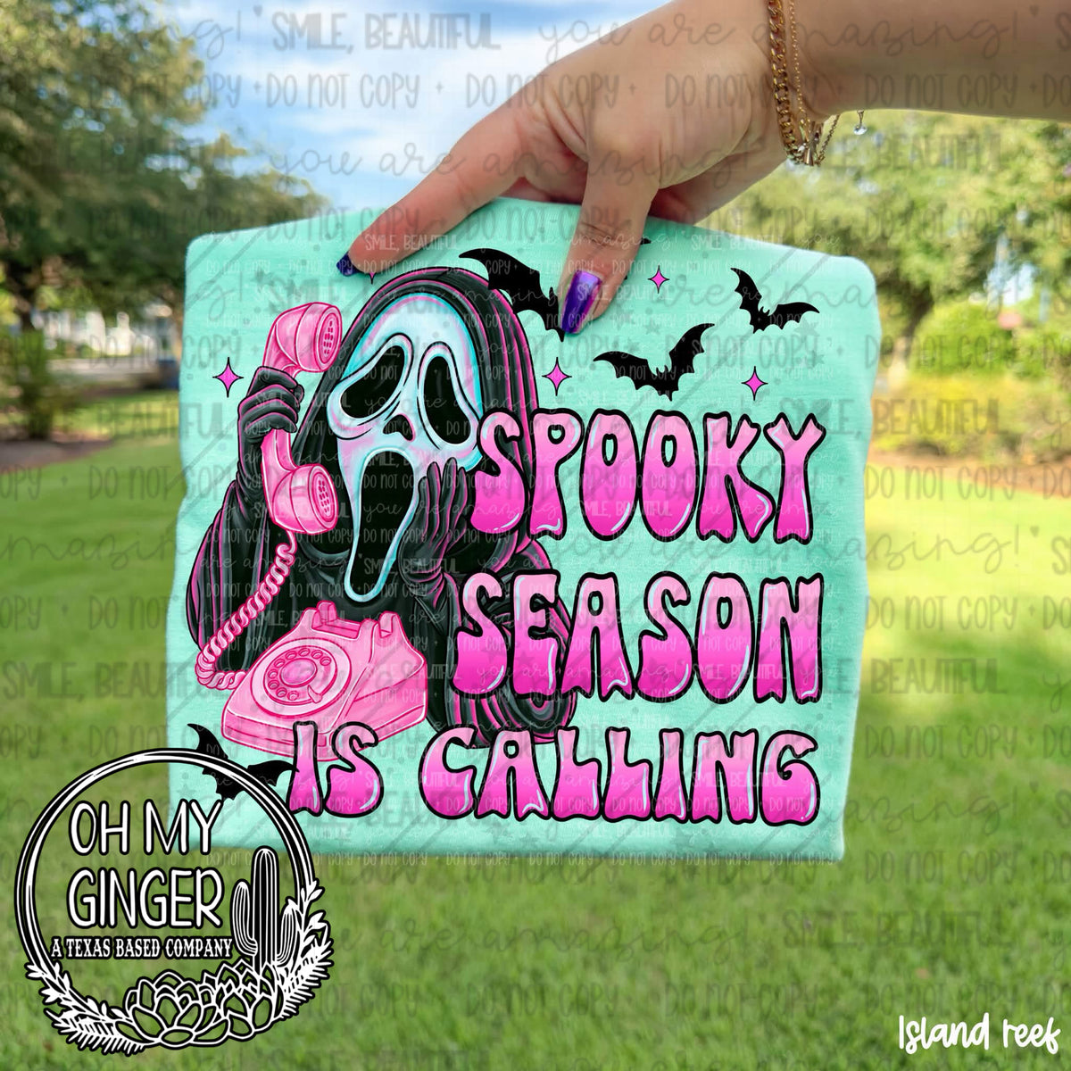 Spooky Season Is Calling design featuring Ghostface answering a bright pink rotary phone beside bold pink Spooky Season Is Calling lettering, bats and sparkles by Oh My Ginger