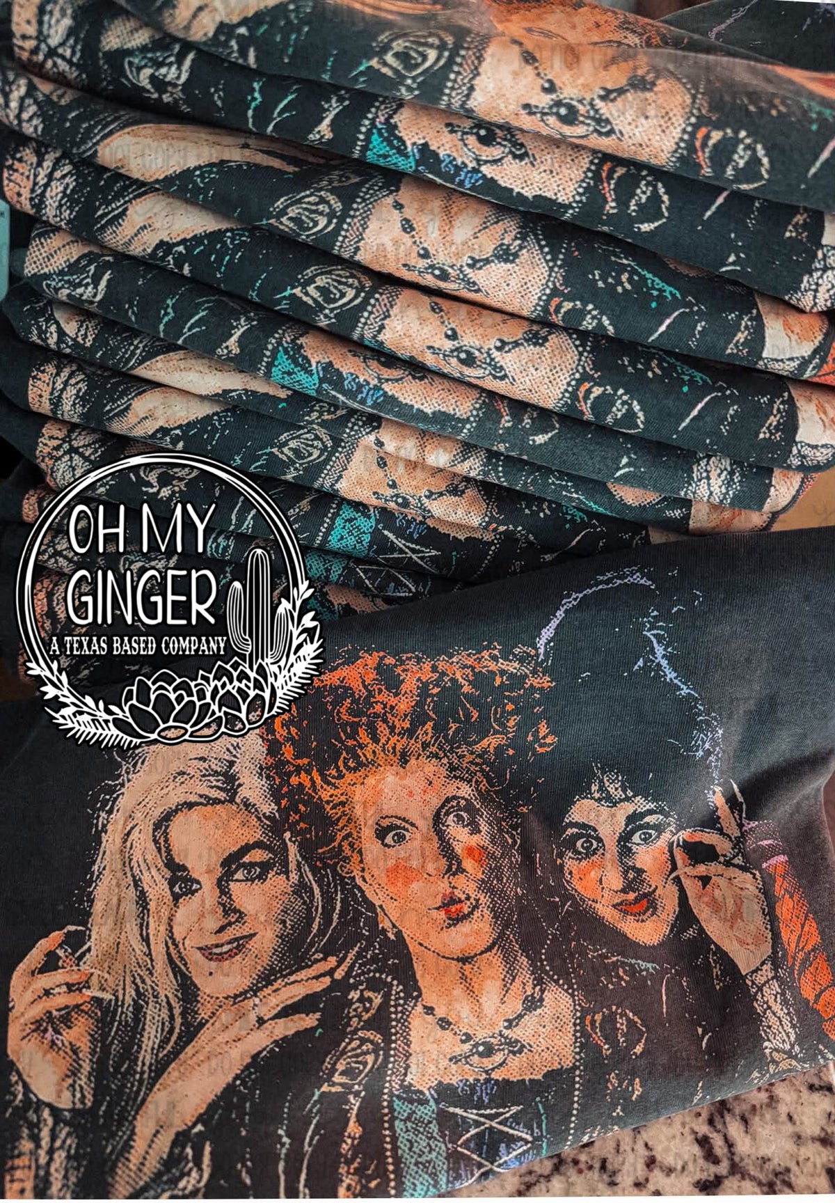 Sanderson Sisters design featuring a vintage distressed portrait of the three Sanderson sisters in warm orange, cream, teal and black tones by Oh My Ginger