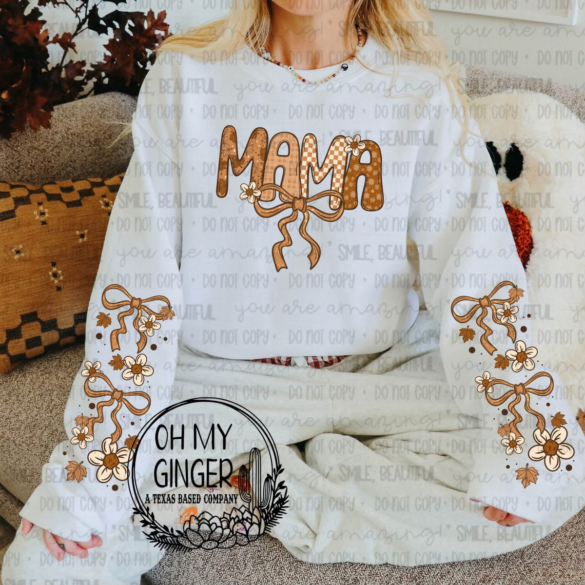 Fall Mama bow graphic on a light sweatshirt with coordinating autumn bow sleeve prints