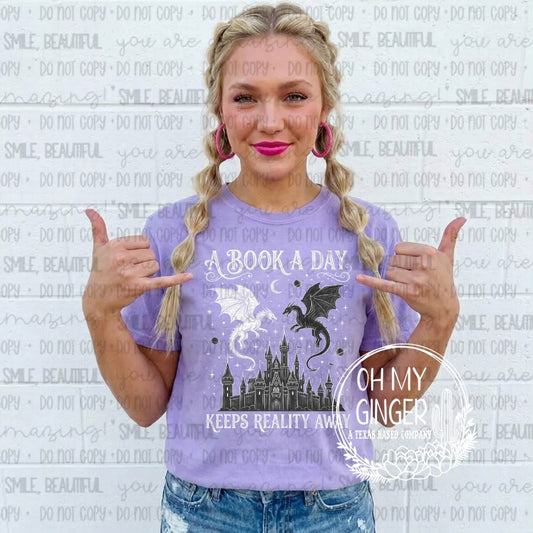 A Book A Day Keeps Reality Away — a fantasy silhouette with a book-a-day message