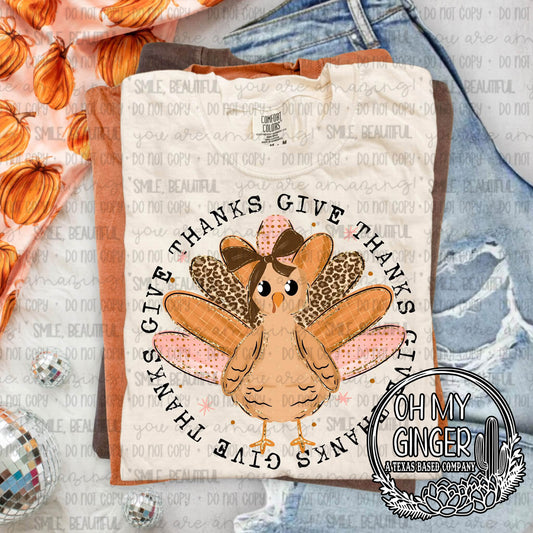 Give Thanks Turkey — a bow-wearing turkey surrounded by give-thanks lettering